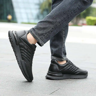 Black leather sneakers.