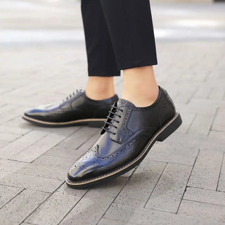 Black leather wingtip dress shoes.