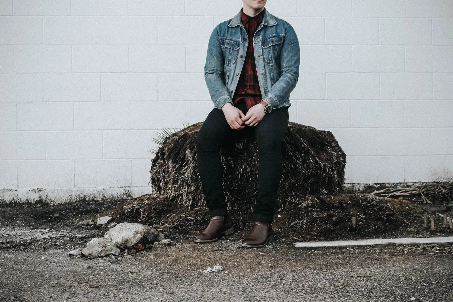 A man wearing Chelsea boots