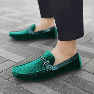 Green velvet loafers.