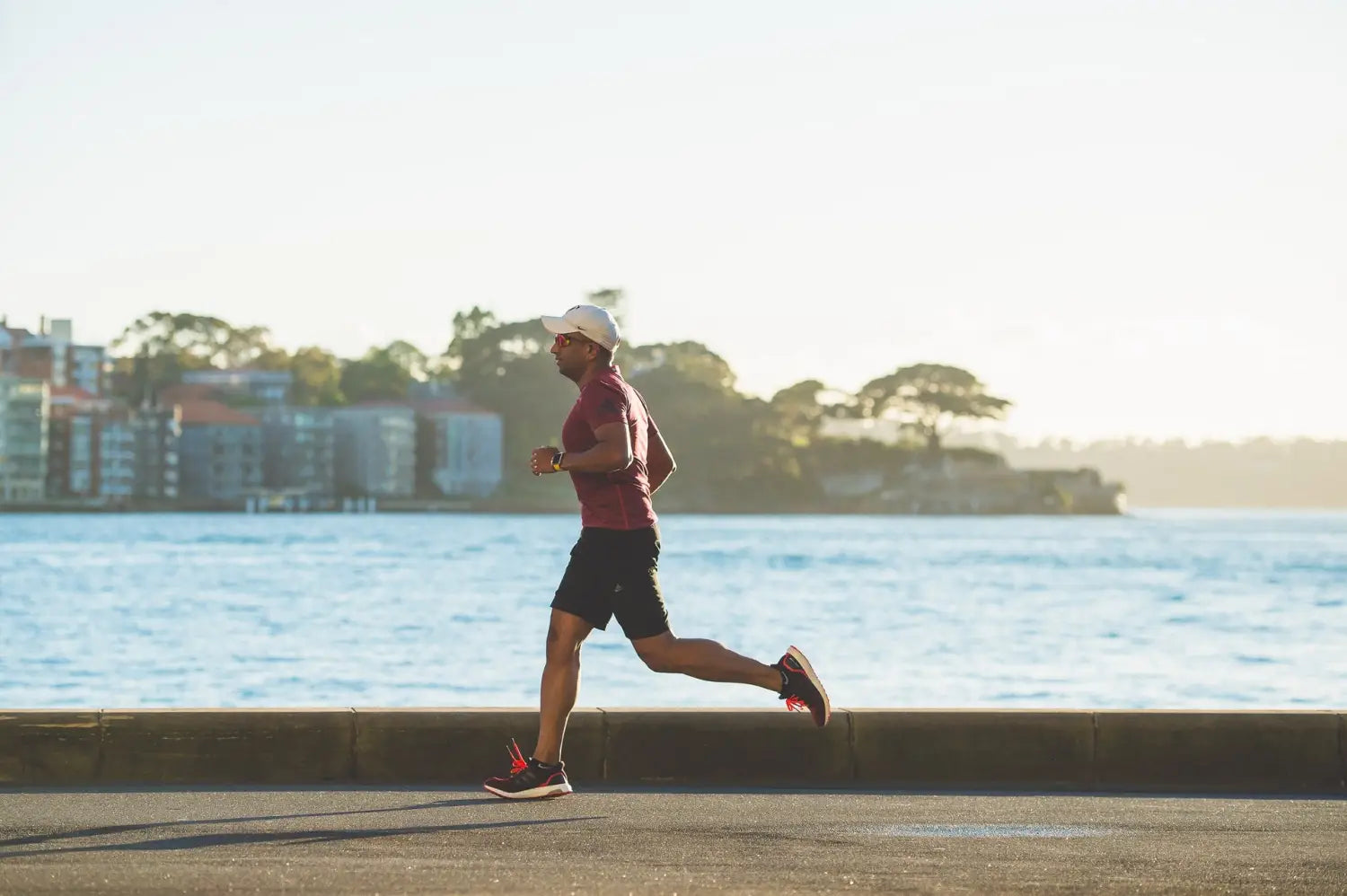 A man jogging by the water