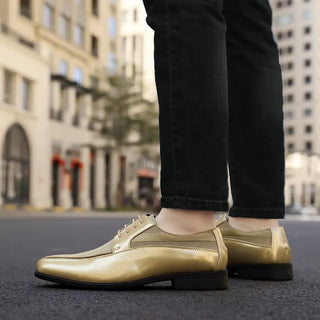 Shiny gold dress shoes.