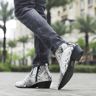 Snakeskin-patterned ankle boots.